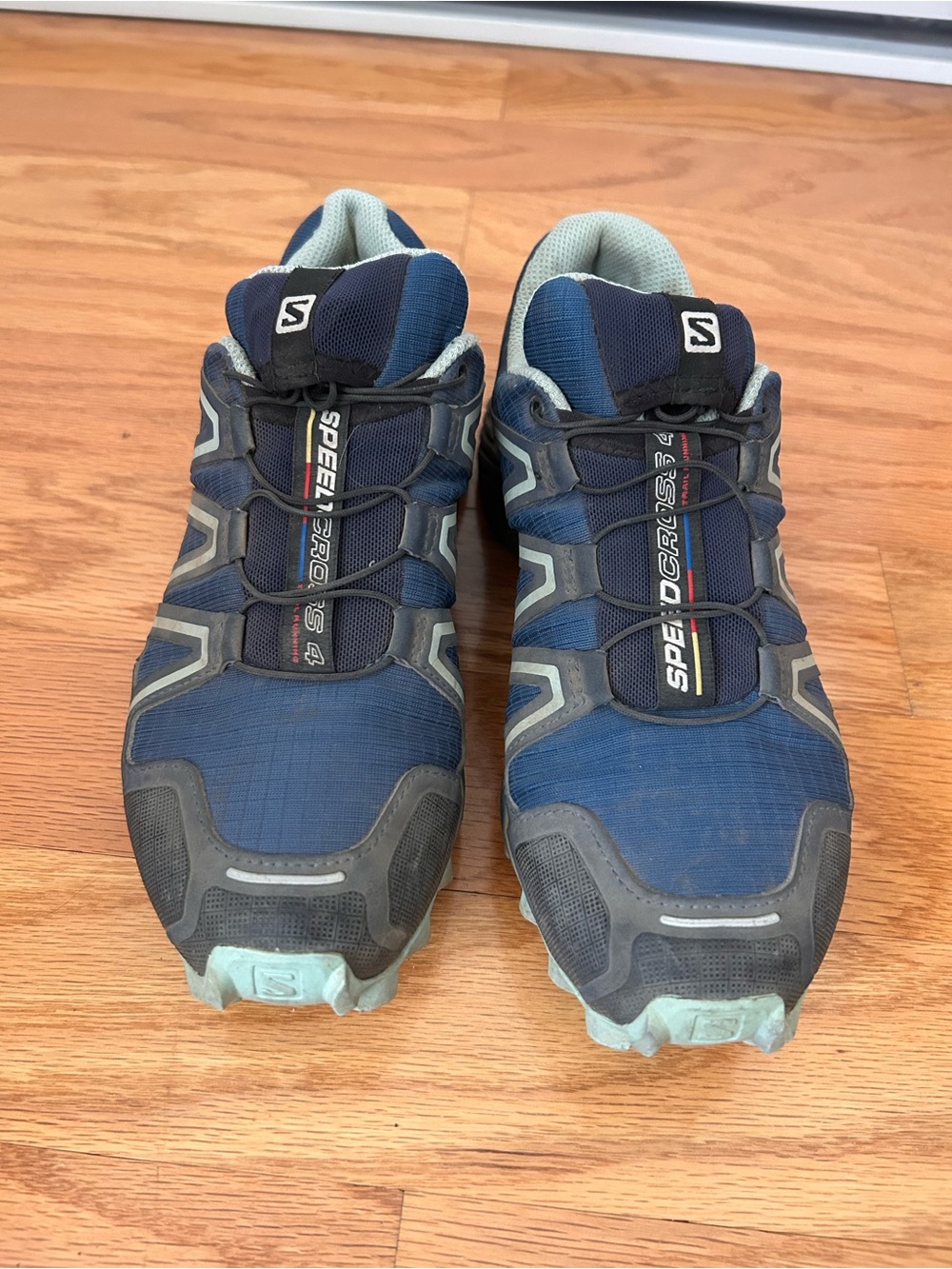 Salomon women’s Trail Running Shoes in Dark Blue and Light Teal